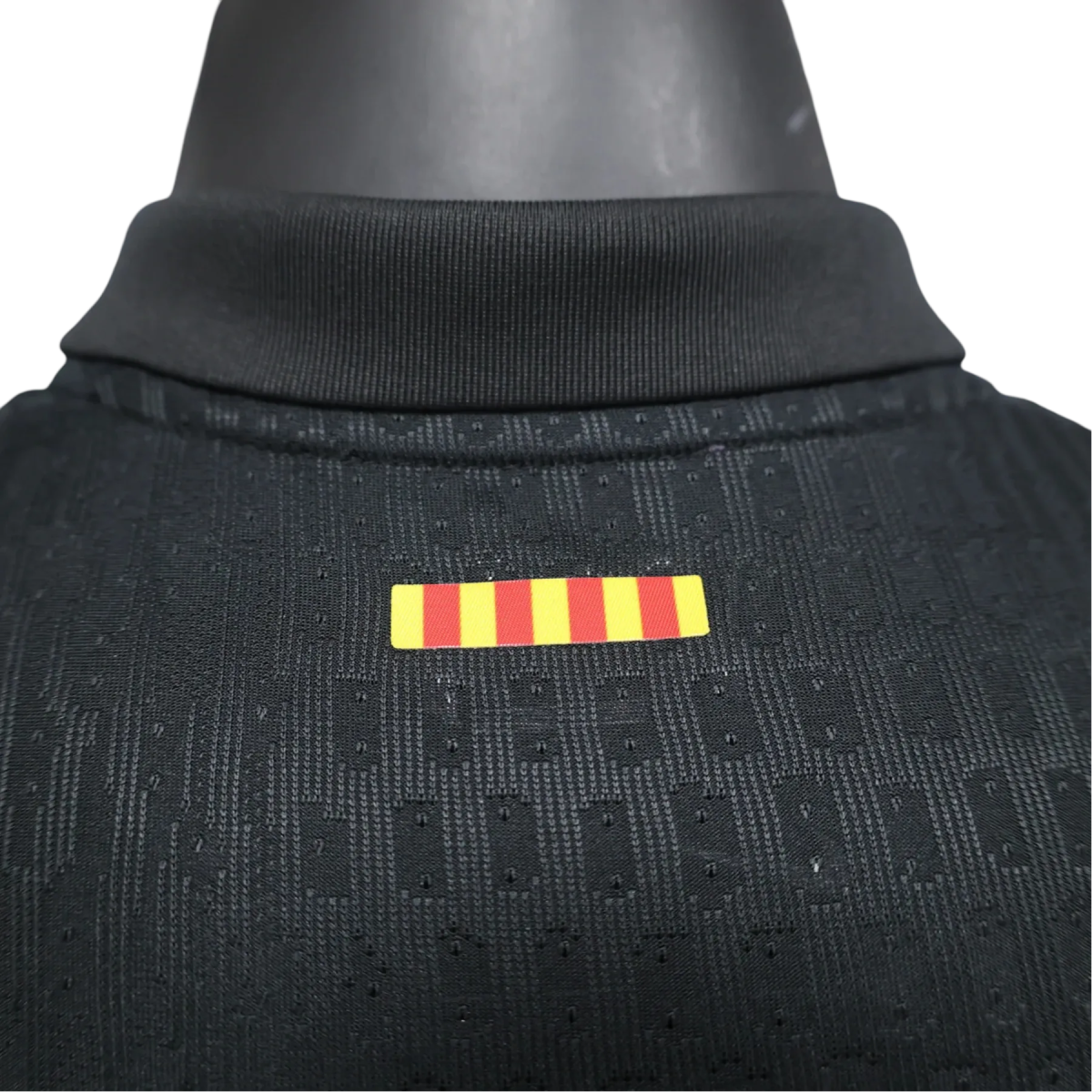 Barcelona 24/25 away kit player version black athletic performance red blue heritage construction